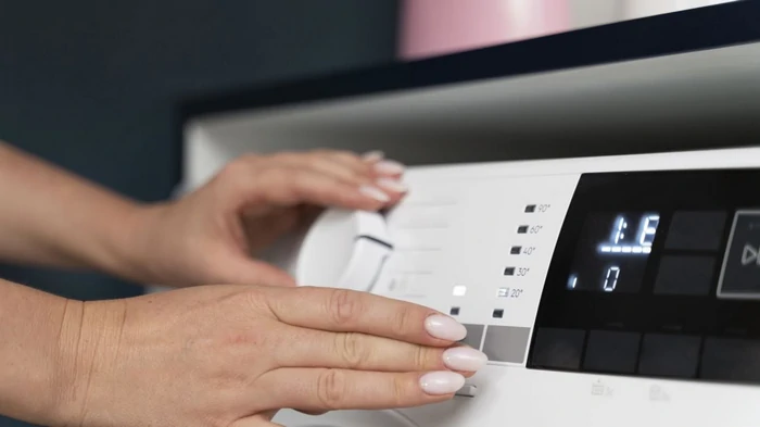 Эта незаметная функция в стиральной машинке поможет сэкономить на электричестве